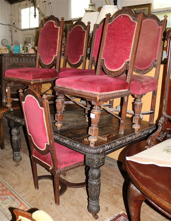 A Victorian carved oak extending dining table & 6 oak dining chairs